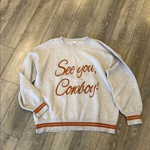Stylish Gray Sweater with Orange Text